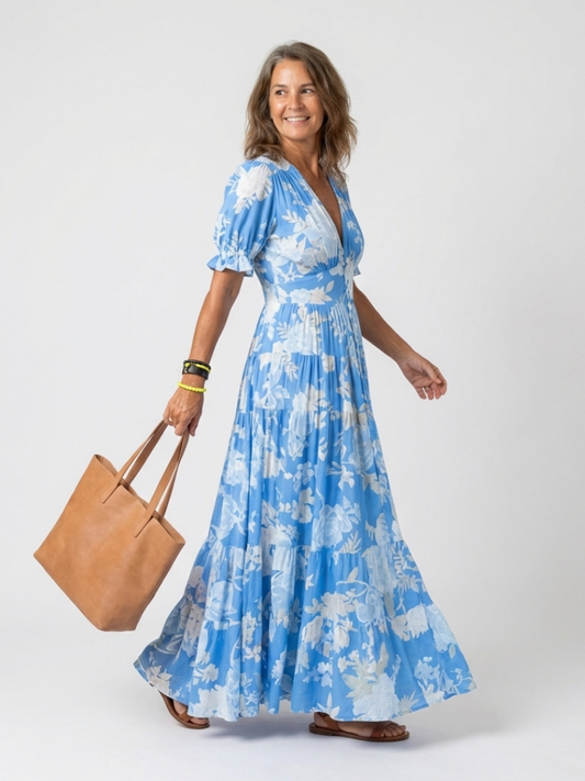 Ione | Vestido midi sin mangas con escote en V y estampado floral