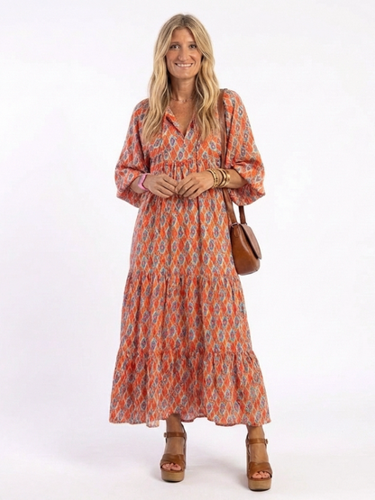 Amara | Vestido midi con escote en V y estampado geométrico