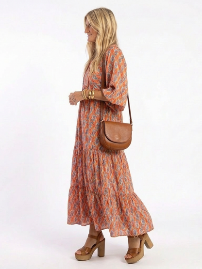 Amara | Vestido midi con escote en V y estampado geométrico