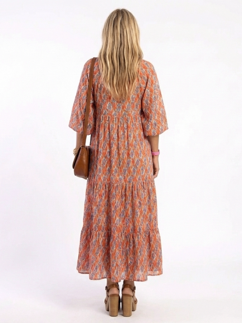 Amara | Vestido midi con escote en V y estampado geométrico