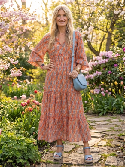 Amara | Vestido midi con escote en V y estampado geométrico