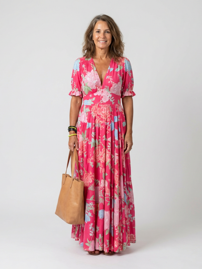 Ione | Vestido midi sin mangas con escote en V y estampado floral
