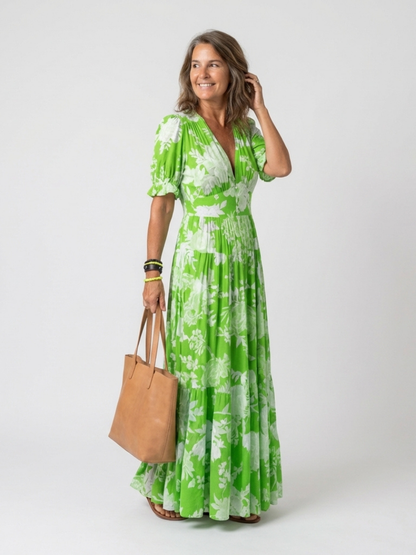 Ione | Vestido midi sin mangas con escote en V y estampado floral